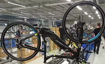 How do manufacturing process audits improve e-bike production quality